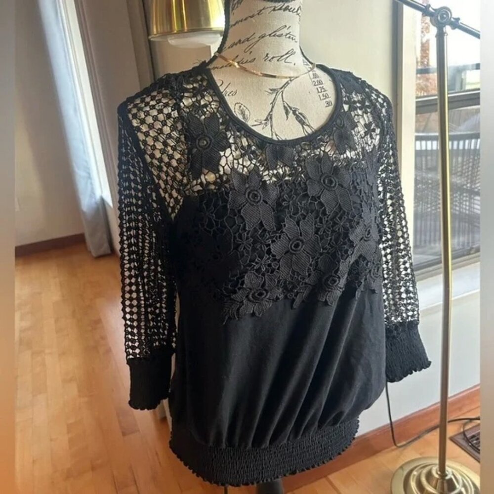 Sakura top size XS black with floral mesh around the shoulder and collar